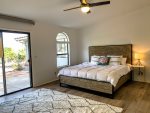 master bedroom with sliding door to the back yard/patio